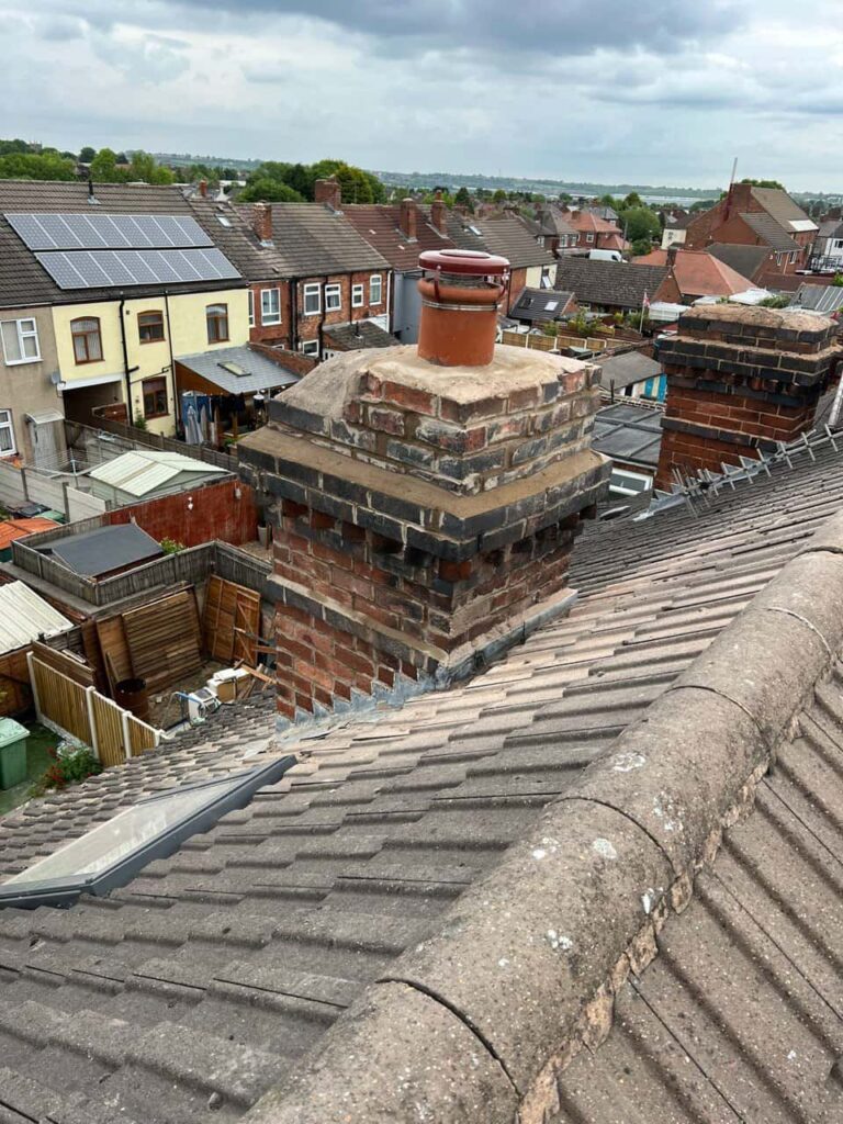 This is a photo taken from a roof which is being repaired by Foots Cray Roofing Repairs, it shows a street of houses, and their roofs